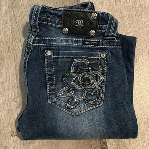 Miss me jeans worn back from boots